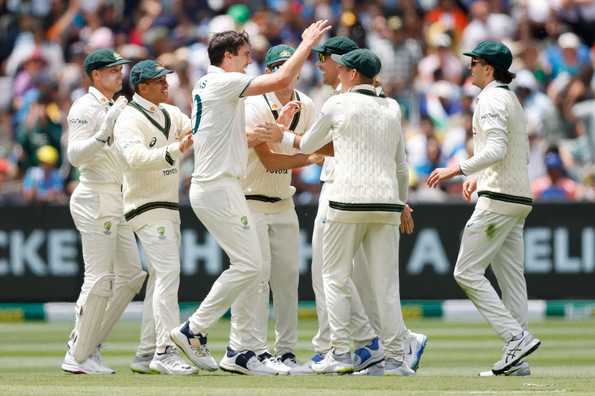 Australia celebrate the fall of Rohit Sharma's wicket