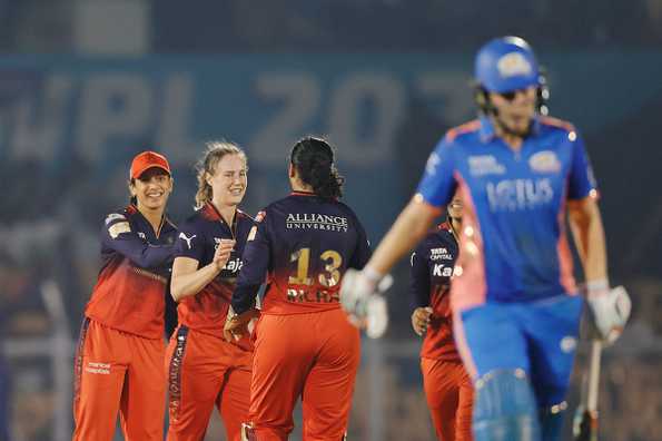 RCB celebrate the wicket of Nat Sciver-Brunt 