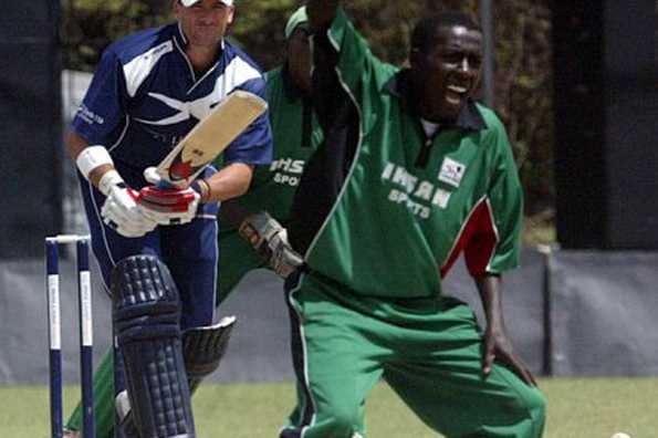 Kenya's Jimmy Kamande (R) is seen during a World Cricket League match in 2007 against Scotland in Nairobi. For a man who has known no other passion than to play cricket, Kamande's rise to the Kenyan captaincy has not been all smooth sailing.