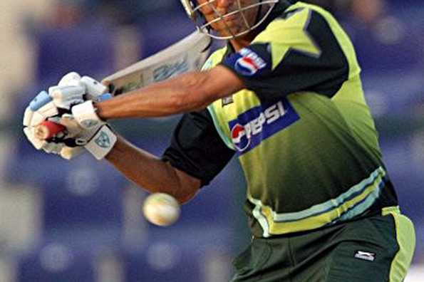 Pakistani batsman Younus Khan eyes the ball during his team's match against West Indies during their third one-day international (ODI) cricket match in Abu Dhabi. Rao Iftikhar returned career-best bowling figures while Younus Khan struck a brilliant hundred to guide Pakistan to a 31-run win over the West Indies in the third and final one-day here on Sunday.