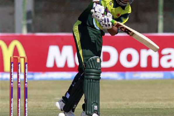 Pakistan's Nasir Jamshed plays a shot against Zimbabwe during a one-day international cricket match in Karachi in this January 21, 2008 file photo. REUTERS/Zahid Hussein/Files