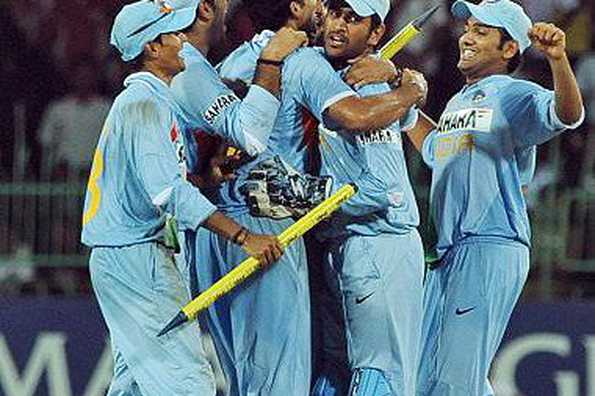 Indian cricket captain Mahendra Singh Dhoni(2ndR) celebrates with teammates as India defeated Sri Lanka by 46 runs in their fourth One Day International match in Colombo.