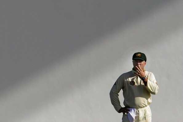 Australian leg-spinner Stuart MacGill watches the action at the Sir Vivian Richards Cricket Ground in St. John's, Antigua, on June 1, 2008. The sudden retirement of MacGill over the weekend could see bowling great Shane Warne come out of international retirement, cricket commentators said Monday.