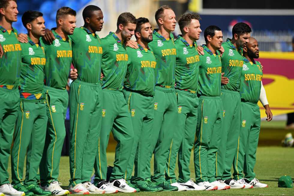 They lined up for the anthems not socially distanced, as the ICC says they should.